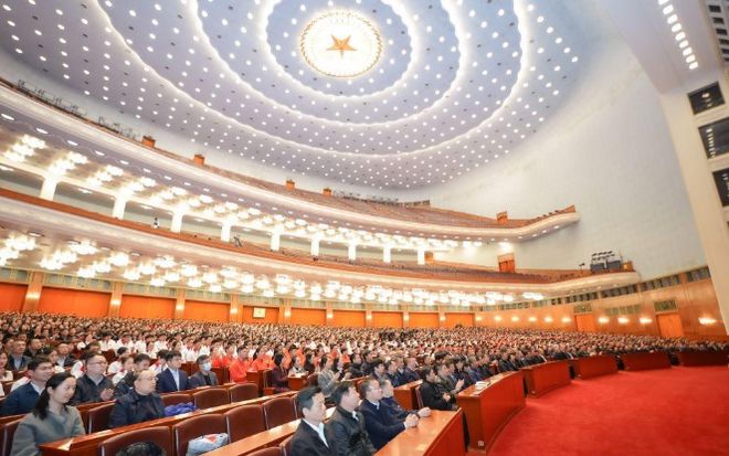 第33届奥运会中国体育代表团报告会在京举行(图2)